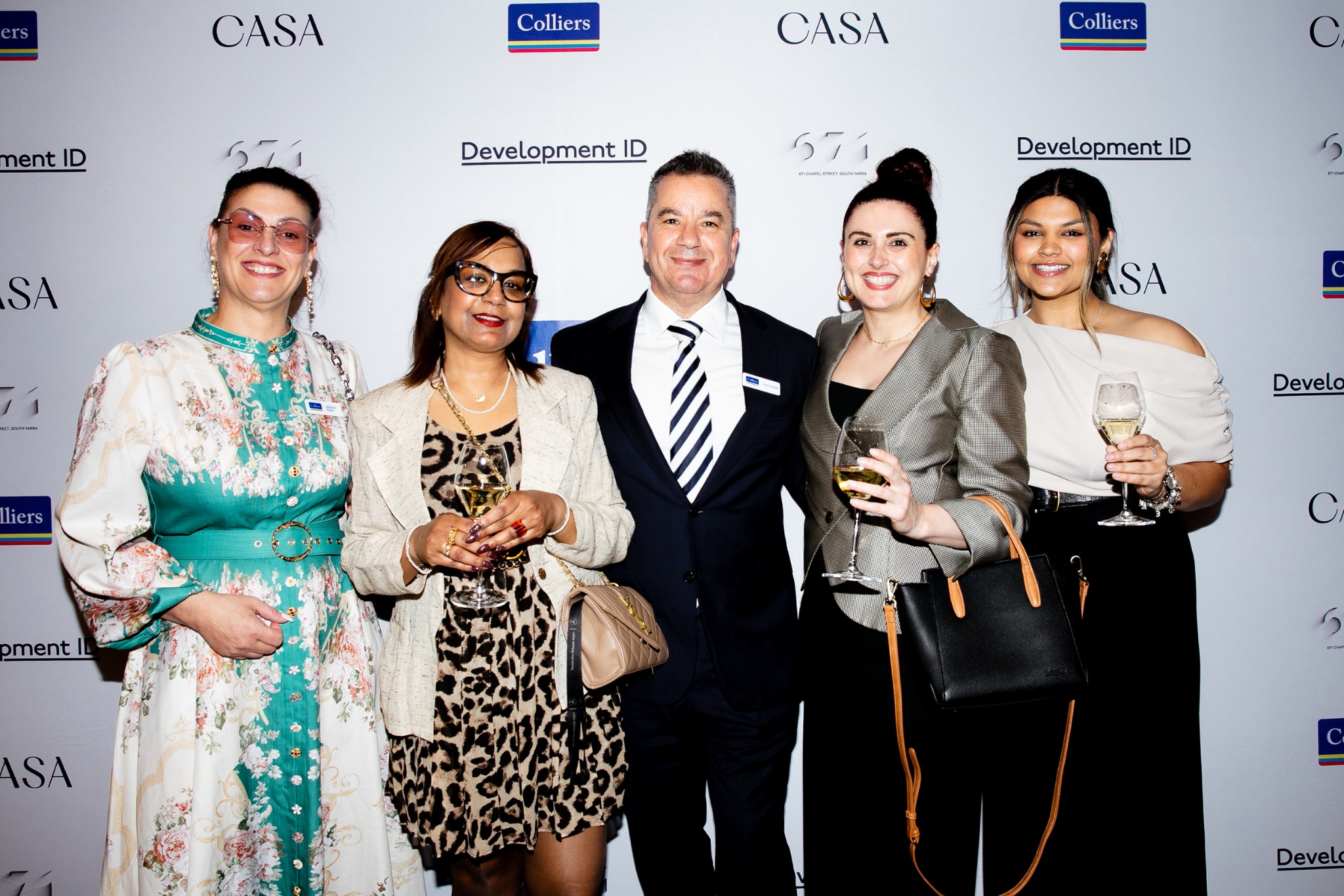 Guests at a Colliers event photographed by Tommy Creative