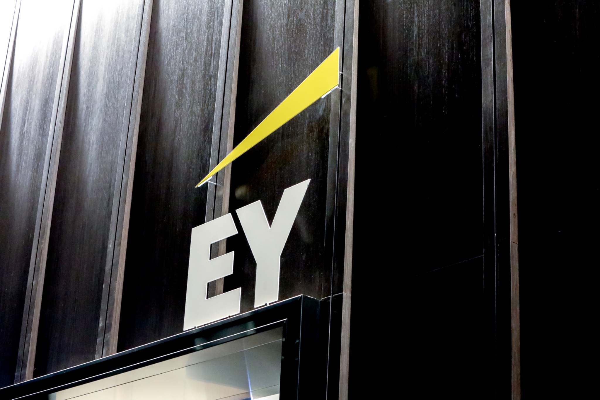 EY signage photographed by Tommy Creative